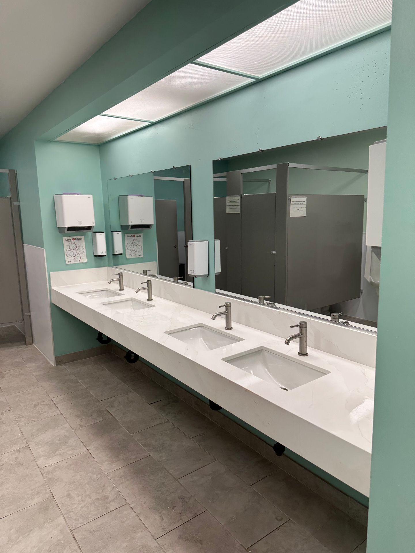 Commercial bathroom remodel with modern finishes
